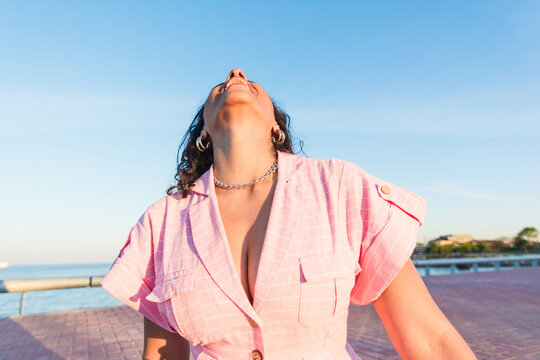 Woman laughing out loud outdoors