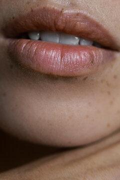  Macro Close Up of Woman's Lips with a lot of Freckles