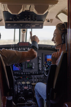 A pilot in the cockpit of an airplane 