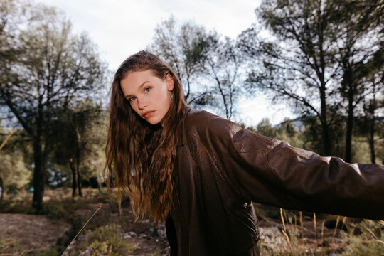 Charming young woman in countryside