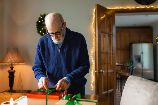 A man unpacks gifts