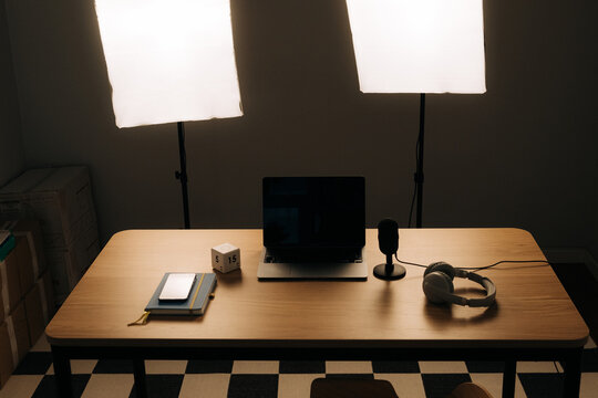 Recording setup with lighting and podcast equipment in minimalis