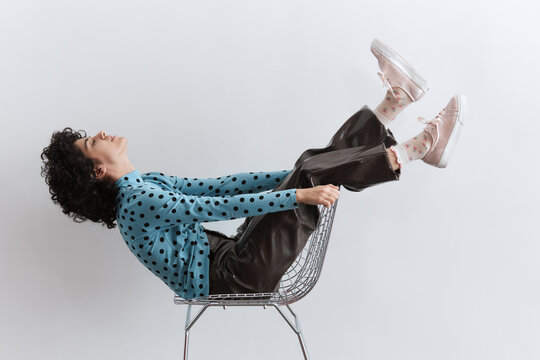 Woman Relaxing on Chair 