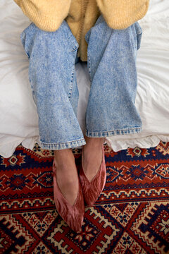 Woman wearing velvet flats