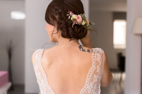 Bride with Floral Hairpiece and Lace Dress