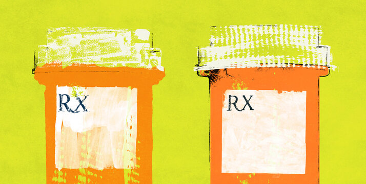 Close-up of Two Pharmacy Prescription bottles with blank RX labels