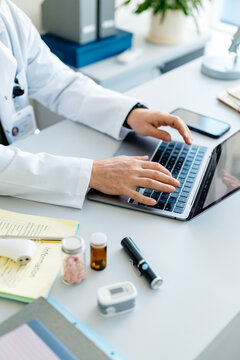 The doctor uses a tablet in the clinic