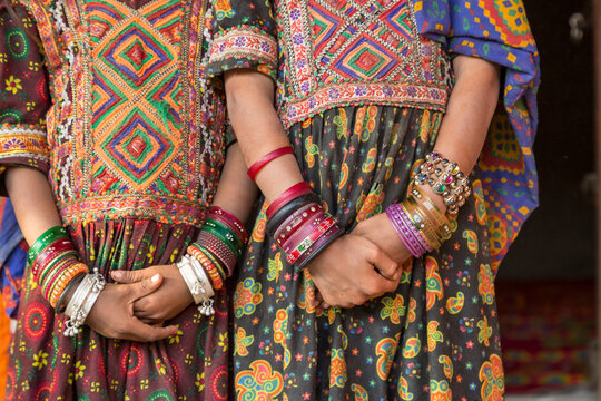 India, State of Gujarat, Bhuj, Kutch District, Hodka, Malik Jat tribes females in typical jewelry and clothing.