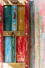 India, State of Gujarat, Bhuj, Meghwal. Bhirandiara. Painted door abstract.