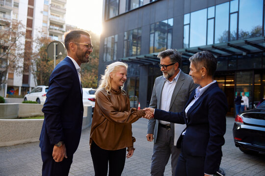 Business meeting in front of the company
