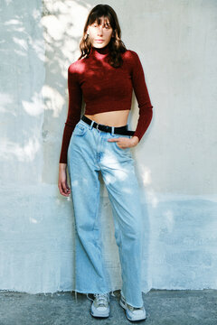 Portrait of a woman in casual clothes on the street