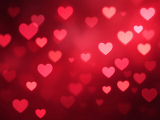 Hearts bokeh on pink background.