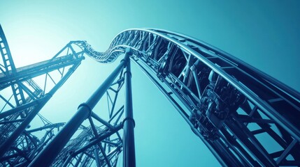 Obraz premium Roller coaster track ascending into the sky.