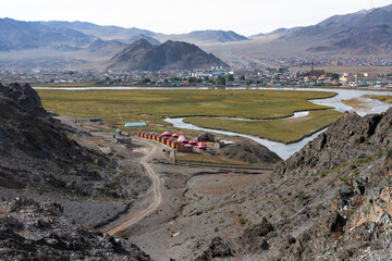 Asia, Mongolia, Bayan-Olgii Province, Olgii, River Khovd. A view of the town of Olgii with the Khovd River flowing through it.