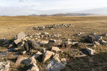 Asia, Mongolia, Hustai National Park, Hustai Mountains. These rocks found high on a hill are actually graves of famous Mongolian warriors.