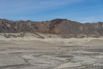 Fototapeta premium Lacustrine deposits are sedimentary rock formations which formed in the bottom of ancient lakes. Shoshone, Inyo County, California. Lake Tecopa is a former lake. Tecopa Lake Beds. Mojave Desert. 
