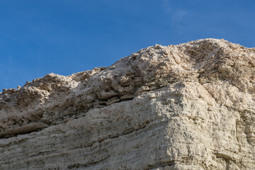 Lacustrine deposits are sedimentary rock formations which formed in the bottom of ancient lakes. Shoshone, Inyo County, California. Lake Tecopa is a former lake. Tecopa Lake Beds. 	Mojave Desert.
