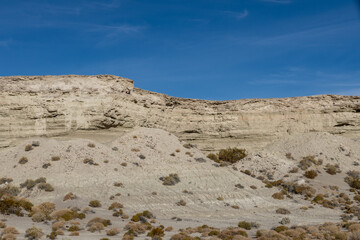 Lacustrine deposits are sedimentary rock formations which formed in the bottom of ancient lakes. Shoshone, Inyo County, California. Lake Tecopa is a former lake. Tecopa Lake Beds. 	Mojave Desert.
