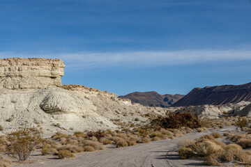 Lacustrine deposits are sedimentary rock formations which formed in the bottom of ancient lakes. Shoshone, Inyo County, California. Lake Tecopa is a former lake. Tecopa Lake Beds. 	Mojave Desert.

