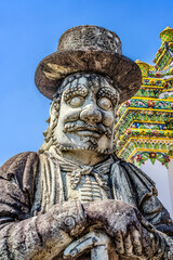Marco Polo guardian, Wat Pho Temple, Bangkok, Thailand. Built in 1600's. Ceramics for temple came from China. Chinese also produced concrete guardians to stabilize ceramics in ships.