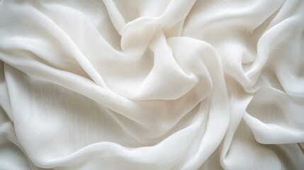 Obraz premium A smooth white fabric with radial folds and textures, captured in soft lighting, creating an elegant and modern visual appeal.