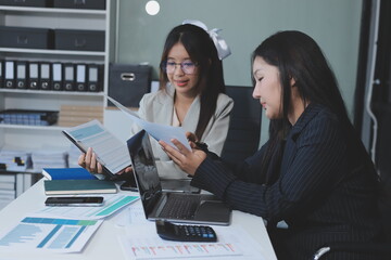 Team of business people are meeting to analyze data for marketing plan,Market research reports and income statistics, Financial and Accounting concept.