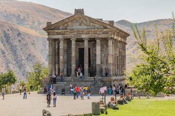 Naklejka premium Armenia, Kotayk Province, Garni. Tourists visiting Roman temple.