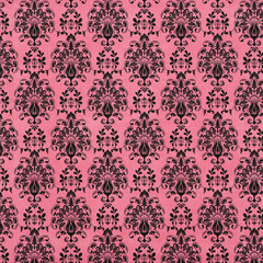 Bright pink damask seamless pattern with black baroque motifs. Perfect for trendy wallpapers, textiles, bold backgrounds, and vintage-inspired decor.