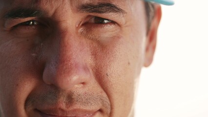 Obraz premium mosquito midge. close-up of the farmer face midges and mosquitoes fly around. fever malaria disease mosquito bite concept. midge sits on the face of lifestyle the farmer bites