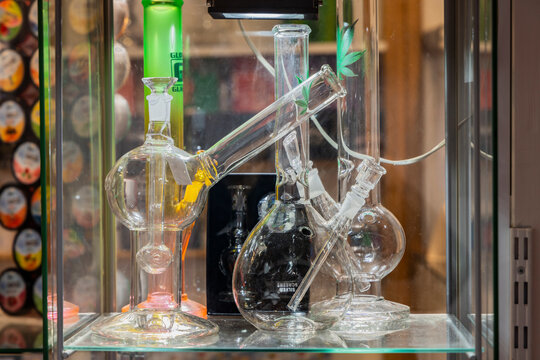 Netherlands, North Holland, Beverwijk. Glass marijuana pipes at a Dutch market.