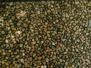 Natural Textured Stone Pebble Surface Background