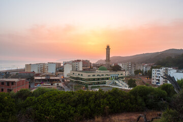 Muslim mosque for prayer and worship of Allah, Omar bin Abdul Aziz Mosque, Jijel State, Algeria, North African mosques in village on Mediterranean coast, Minaret and dome of  mosque, Ramadan iftar.