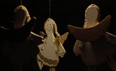 Three levitating wooden Angels on the ropes © Oliwia