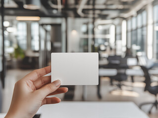 Mockup business card white blank, A hand holding a blank white card in a modern office setting, Concept for branding presentation, corporate identity, advertising, graphic design, Generative AI