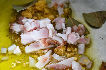 Pan with seasoning to prepare beans