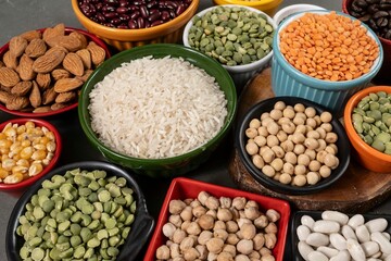 several pots with raw grains for preparing healthy food