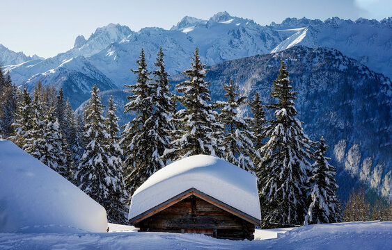 Mountain hut in snow in winter. hut in snowy mountains - Powered by Adobe