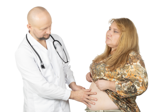 Healthcare professional examining female patient's abdomen during medical checkup