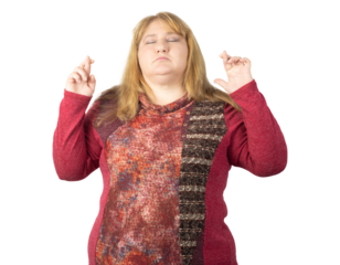 Hopeful female crossing fingers with eyes closed in anticipation