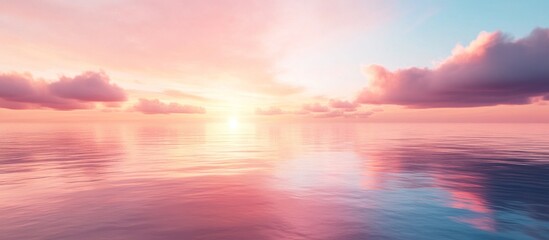 Serene pink sunset over calm ocean water.