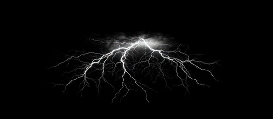Dramatic white lightning strike on black background.
