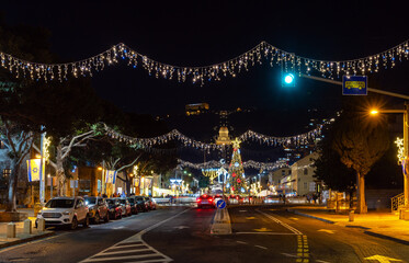 New Year tree and symbols of three religions Judaism, Christianity, Islam in Haifa