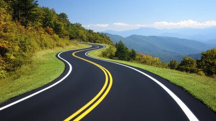 Fototapeta premium Winding Asphalt Road Through Scenic Mountain Pass