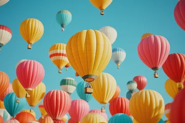 Colorful hot air balloons fill a vibrant sky, creating a breathtaking spectacle.