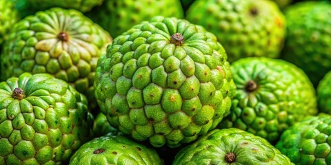 Fototapeta premium Close-up: Green fruit speckled with brown decay, revealing nature's textured decline.