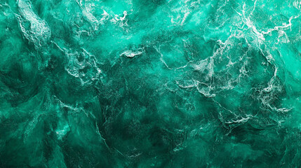 Fototapeta premium Turquoise waves form intricate patterns in the ocean waters under bright sunlight
