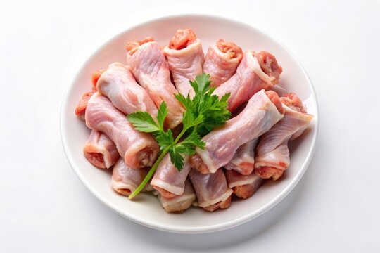 Isolated raw chicken necks, a clean food photography mockup on a white background; ideal for recipe ingredients.