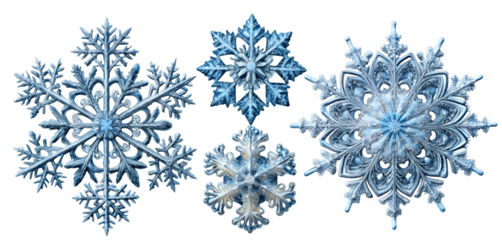 four intricate snowflakes with unique patterns cut out