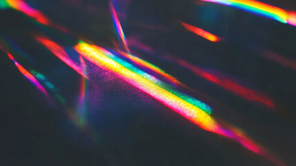 Colorful prismatic light leaks on dark background