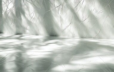 Light and shadow play on a textured surface.